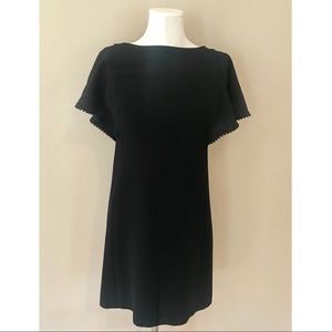 LOFT black sheath dress with ruffle sleeves